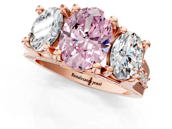 Rose gold Fancy Pink Oval Cut Diamond Three-Stone Ring with Channel Set Band and Four-Prong Setting