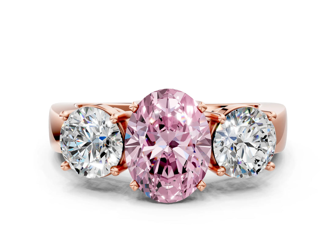 Rose gold Three-Stone Fancy Pink Oval Cut Diamond Ring with Round Side Stones, Classic Band, and Four-Prong Setting