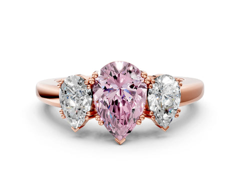 Rose gold Three-Stone Fancy Pink Pear Cut Cut Diamond Ring with Channel Set Band and Four-Prong Setting