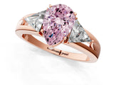 Rose gold Three-Stone Fancy Pink Pear Cut Cut Diamond Ring with Trillion Side Stones on a Split Shank Band_1