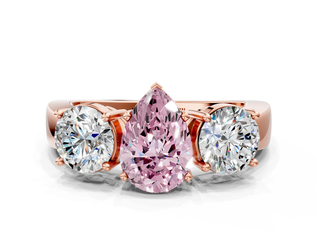 Rose gold Three-Stone Fancy Pink Pear Cut Diamond Ring with Round Side Stones, Classic Band, and Four-Prong Setting