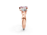 Rose gold Three-Stone Fancy Pink Pear Cut Diamond Ring with Round Side Stones, Classic Band, and Four-Prong Setting_2