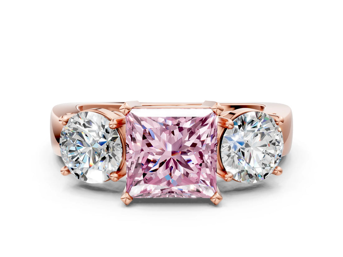 Rose gold Three-Stone Fancy Pink Princess Cut Diamond Ring with Round Side Stones, Classic Band, and Four-Prong Setting