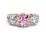 Rose gold Three-Stone Fancy Pink Round Cut Diamond Ring with Round Side Stones, Classic Band, and Four-Prong Setting