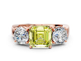 Rose gold Three-Stone Fancy Yellow Asscher Cut Diamond Ring with Round Side Stones, Classic Band, and Four-Prong Setting