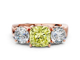 Rose gold Three-Stone Fancy Yellow Cushion Cut Diamond Ring with Round Side Stones, Classic Band, and Four-Prong Setting