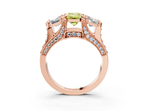Rose gold Fancy Yellow Emerald Cut Diamond Three-Stone Ring with Channel Set Band and Four-Prong Setting