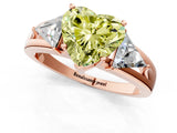 Rose gold Three-Stone Fancy Yellow Heart Cut Cut Diamond Ring with Trillion Side Stones on a Split Shank Band_1