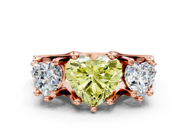 Rose gold Fancy Yellow Heart Cut Diamond Three-Stone Ring with Channel Set Band and Four-Prong Setting