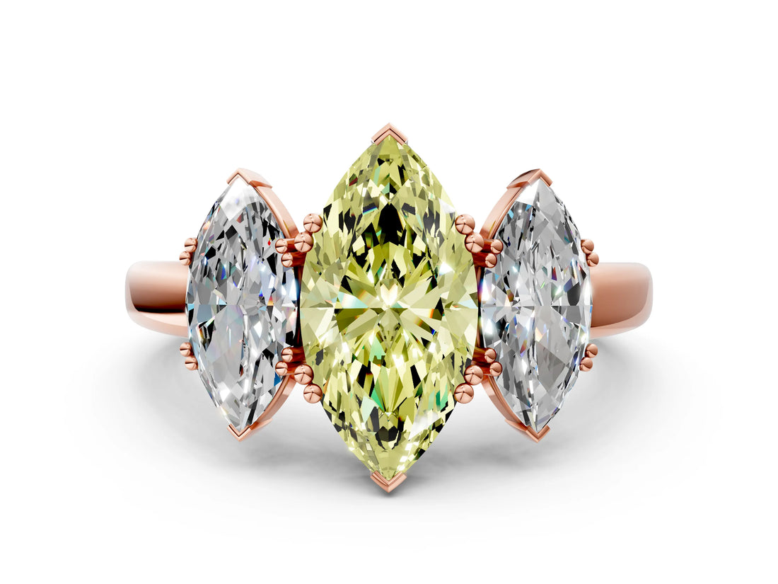 Rose gold Three-Stone Fancy Yellow Marquise Cut Cut Diamond Ring with Channel Set Band and Four-Prong Setting