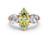 Rose gold Three-Stone Fancy Yellow Marquise Cut Cut Diamond Ring with Channel-Set Band and Prong Setting