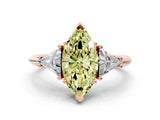 Rose gold Three-Stone Fancy Yellow Marquise Cut Cut Diamond Ring with Trillion Side Stones and Four-Prong Setting_3