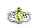 Rose gold Three-Stone Fancy Yellow Marquise Cut Diamond Channel Set Engagement Ring with Prong Setting