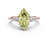 Rose gold Three-Stone Fancy Yellow Marquise  Cut Diamond Ring with Pear Side Stones in Four-Prong Setting