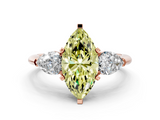 Rose gold Three-Stone Fancy Yellow Marquise  Diamond Ring with Pear Side Stones in Four-Prong Setting