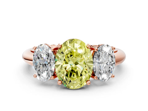 Rose gold Three-Stone Fancy Yellow Oval Cut Cut Diamond Engagement Ring with Prong Setting on a White Gold Band