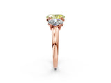 Rose gold Three-Stone Fancy Yellow Oval Cut Cut Diamond Ring with Channel Set Band and Four-Prong Setting_26