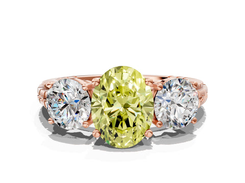 Rose gold Three-Stone Fancy Yellow Oval Cut Cut Diamond Ring with Channel-Set Band and Prong Setting