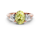 Rose gold Three-Stone Fancy Yellow Oval Cut Cut Diamond Ring with Trillion Side Stones and Four-Prong Setting_3