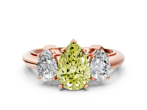 Rose gold Three-Stone Fancy Yellow Pear Cut Cut Diamond Engagement Ring with Prong Setting on a White Gold Band
