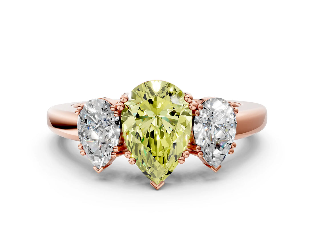 Rose gold Three-Stone Fancy Yellow Pear Cut Cut Diamond Ring with Channel Set Band and Four-Prong Setting