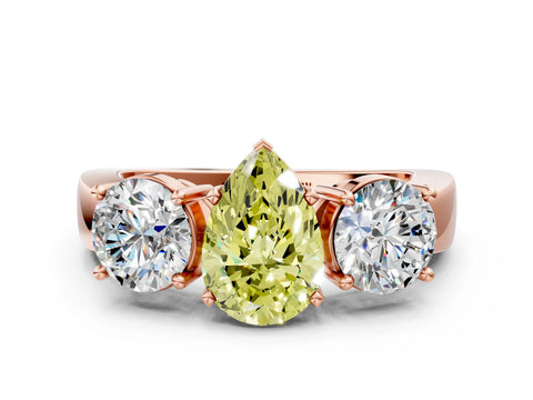 Rose gold Three-Stone Fancy Yellow Pear Cut Diamond Ring with Round Side Stones, Classic Band, and Four-Prong Setting