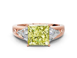Rose gold Three-Stone Fancy Yellow Princess Cut Cut Diamond Ring with Trillion Side Stones on a Split Shank Band