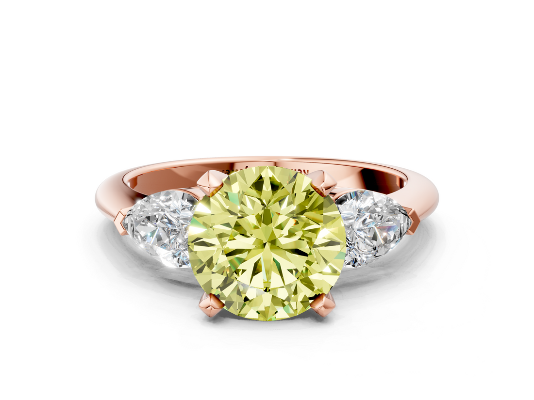 Rose gold Three-Stone Fancy Yellow Round  Diamond Ring with Pear Side Stones in Four-Prong Setting