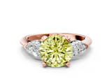 Rose gold Three-Stone Fancy Yellow Round  Diamond Ring with Pear Side Stones in Four-Prong Setting