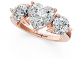 Rose gold Three-Stone Heart Brilliant Cut Solitaire Ring with Prong Setting on a Classic Band 1