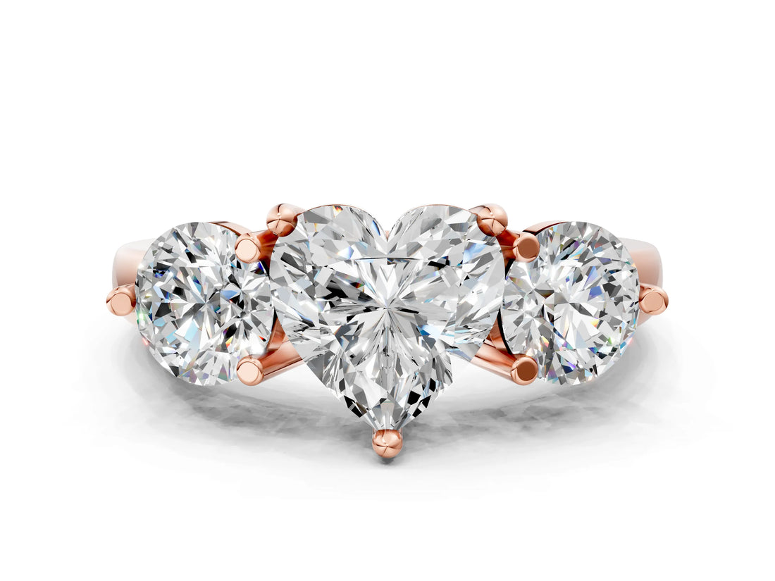 Rose gold Three-Stone Heart Brilliant Cut Solitaire Ring with Prong Setting on a Classic Band