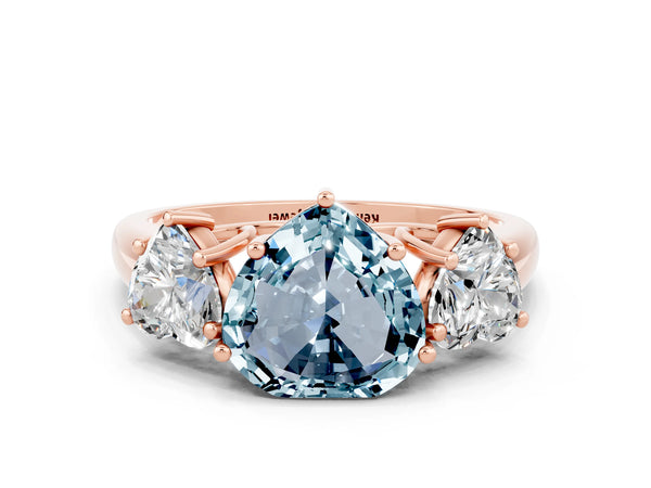 Rose gold Three-Stone Heart Cut Aquamarine Engagement Ring with Prong Setting