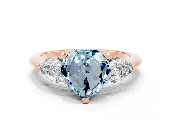 Rose gold Three-Stone Heart Cut Aquamarine Ring with Pear Side Stones and Four-Prong Setting