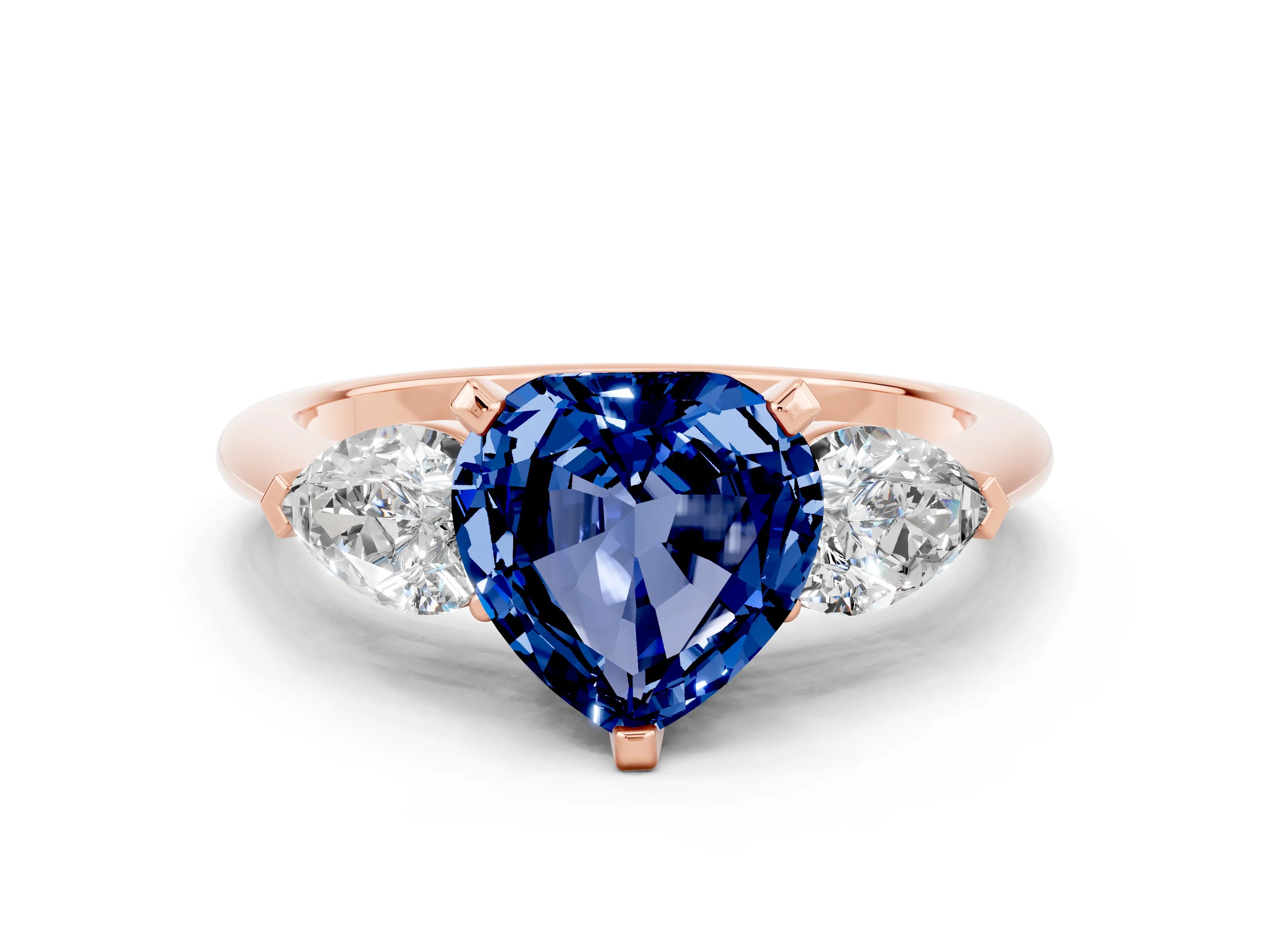 Rose gold Three-Stone Heart Cut Blue Sapphire Ring with Pear Side Stones and Four-Prong Setting