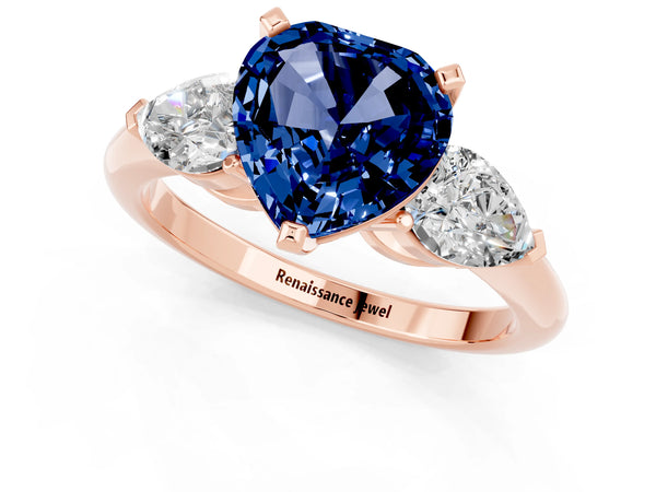 Rose gold Three-Stone Heart Cut Blue Sapphire Ring with Pear Side Stones and Four-Prong Setting