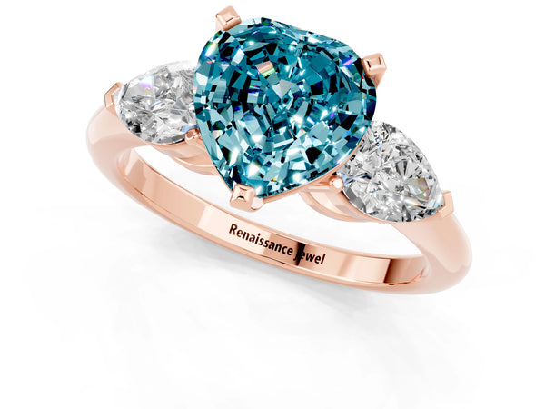 Rose gold Three-Stone Heart Cut Blue Topaz Ring with Pear Side Stones and Four-Prong Setting