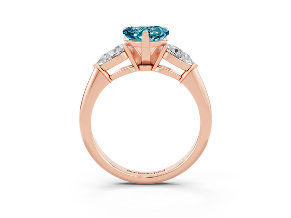 Rose gold Three-Stone Heart Cut Blue Topaz Ring with Pear Side Stones and Four-Prong Setting