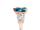 Rose gold Three-Stone Heart Cut Blue Topaz Ring with Pear Side Stones and Four-Prong Setting_5