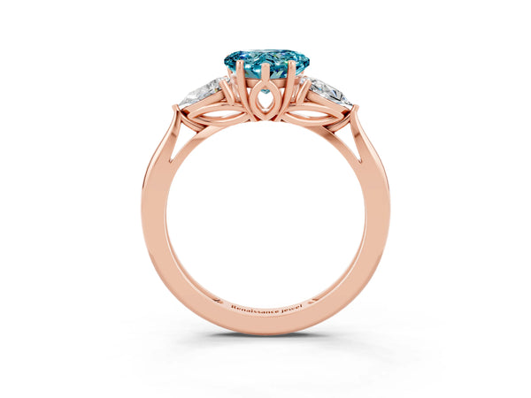 Rose gold Three-Stone Heart Cut Blue Topaz Ring with Pear  Side Stones in Four-Prong Setting