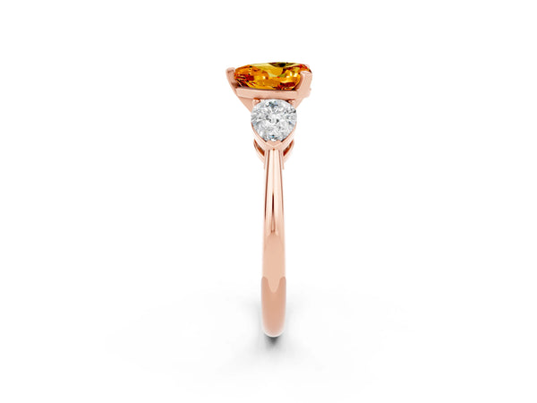 Rose gold Three-Stone Heart Cut Citrine Ring with Pear Side Stones and Four-Prong Setting