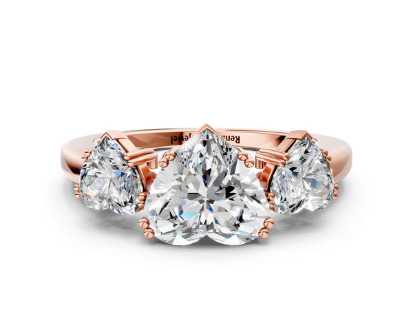 Rose gold Three-Stone Heart Cut Cut Diamond Ring with Channel Set Band and Four-Prong Setting