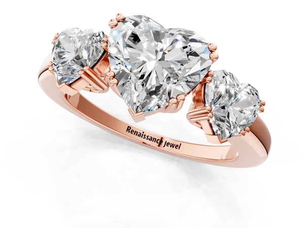 Rose gold Three-Stone Heart Cut Cut Diamond Ring with Channel Set Band and Four-Prong Setting