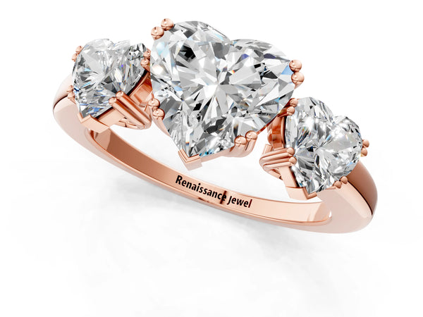 Rose gold Three-Stone Heart Cut Cut Diamond Ring with Channel Set Band and Four-Prong Setting