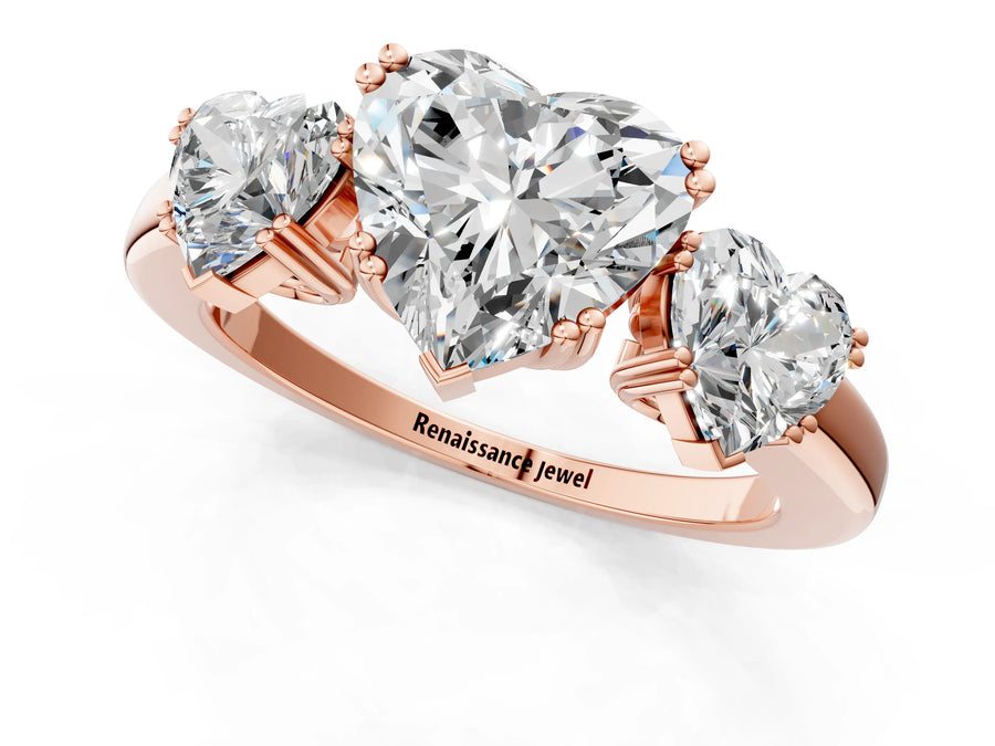 Rose gold Three-Stone Heart Cut Cut Diamond Ring with Channel Set Band and Four-Prong Setting