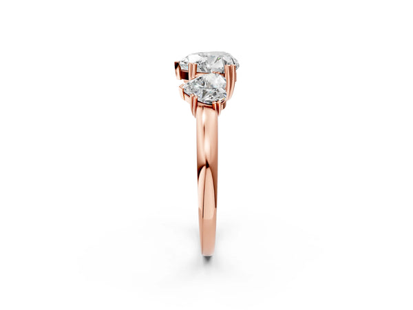 Rose gold Three-Stone Heart Cut Cut Diamond Ring with Channel Set Band and Four-Prong Setting