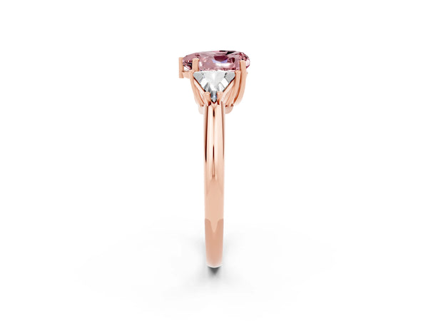 Rose gold Three-Stone Heart Cut Cut Diamond Ring with Trillion Side Stones and Four-Prong Setting