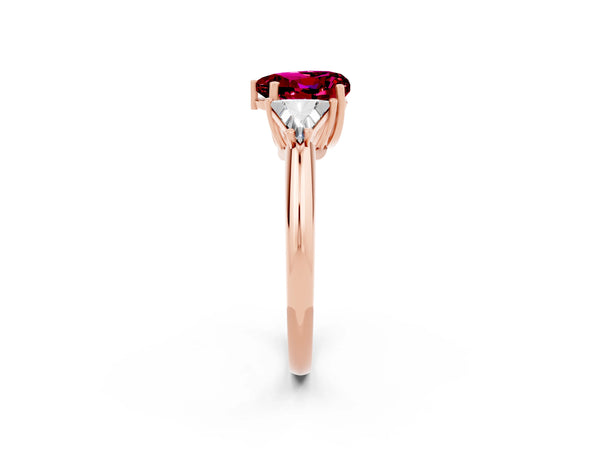 Rose gold Three-Stone Heart Cut Garnet Engagement Ring with Trillion Side Stones and Prong Setting