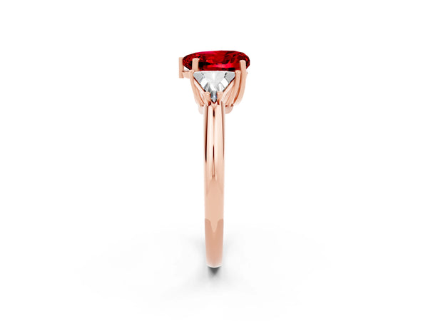 Rose gold Three-Stone Heart Cut Cut Diamond Ring with Trillion Side Stones and Four-Prong Setting