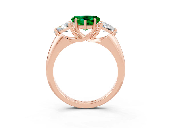 Rose gold Three-Stone Heart Cut Emerald Engagement Ring with Trillion Side Stones and Prong Setting