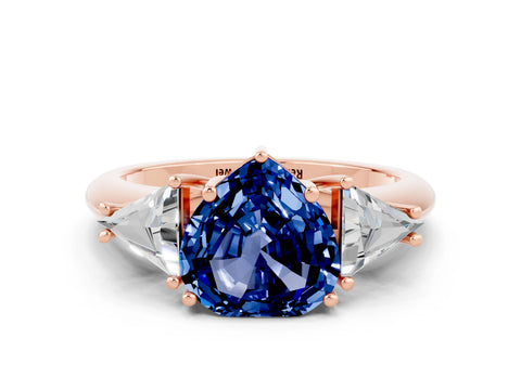 Rose gold Three-Stone Heart Cut Cut Diamond Ring with Trillion Side Stones and Four-Prong Setting